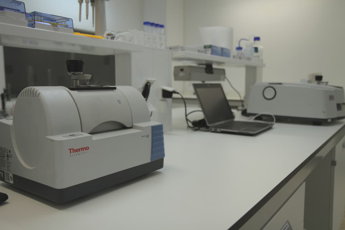 Laboratory table with various scientific equipment